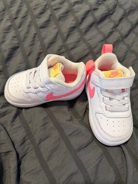 Nike Kids White Sneakers with Pink Swoosh